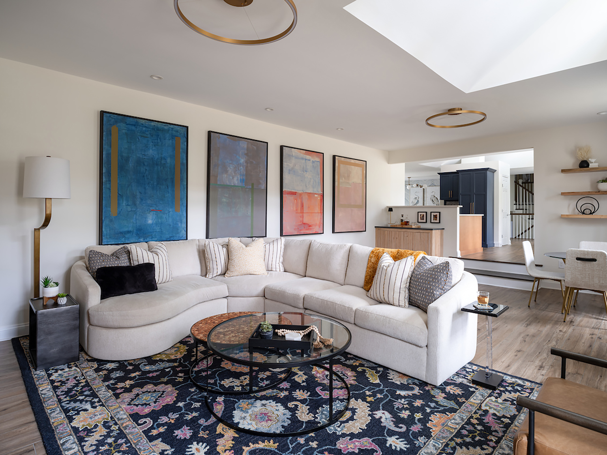 Fall-themed living room with textured fabrics and floor coverings.